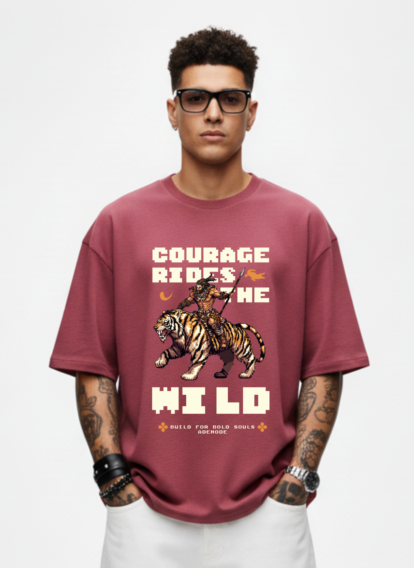 Person wearing a maroon t-shirt with a tiger graphic and text on a white background